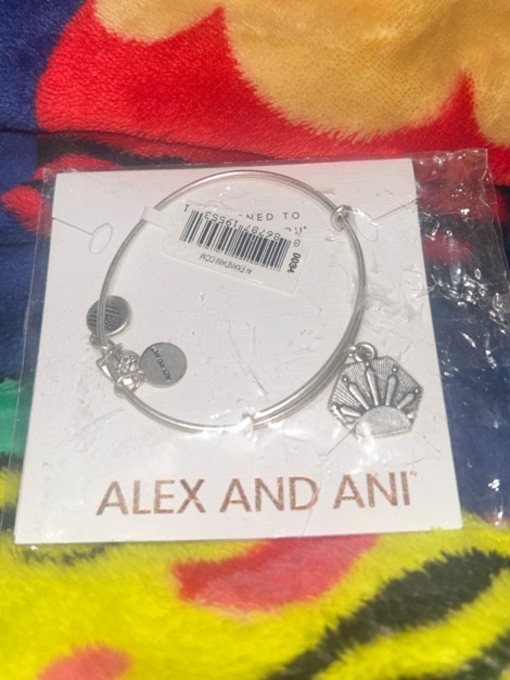 Alex and Ani Silver Bangle with Sun Charm. NWT